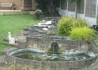 View of the pond. Decided to get rid of it as too much trouble trying to keep the fish, and someone had vandalised the electrics.